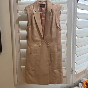 Plunging neck tuxedo dress with shimmer deatil.